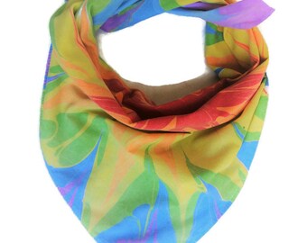 Cotton bandana with marbled in a rainbow flower pattern.