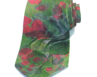 Green silk necktie marbled in an abstract pattern with pink
