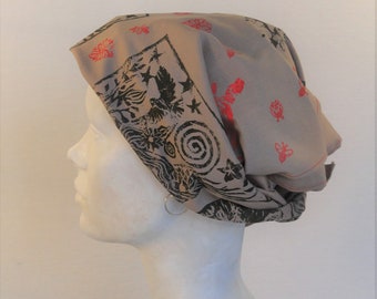 Gaia design bandanna, block printed in red and brown.