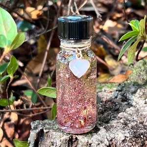 LOVE SPELL OIL. To Attract A Lover, Soulmate, or To Strengthen The Love In Your Relationship. Open A Heart. 4 Dram - 8 Dram.