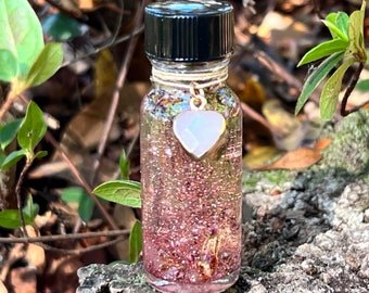 LOVE SPELL OIL. To Attract A Lover, Soulmate, or To Strengthen The Love In Your Relationship. Open A Heart. 4 Dram - 8 Dram.