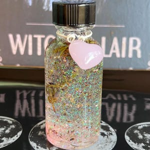 LOVE SPELL OIL. To Attract A Lover, Soulmate, or To Strengthen The Love In Your Relationship. Open A Heart. 4 Dram - 8 Dram.