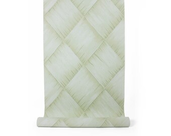 May include: A roll of wallpaper featuring a woven basket pattern in shades of light green and white. The design consists of a repeating diamond pattern, creating a textured appearance. The wallpaper is unrolled at the bottom, revealing the pattern.