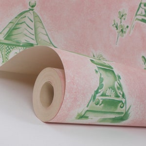 May include: A roll of pink wallpaper with a green and white pattern of garden gazebos, benches, and butterflies.