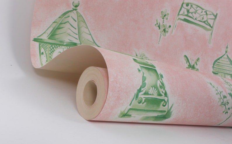 May include: A roll of pink wallpaper with a green and white pattern of garden gazebos, benches, and butterflies.