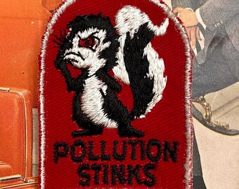 Deadstock 1970s "Pollution Stinks!" Skunk Embroidered Patch