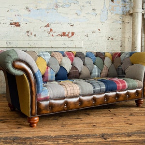 3 seater Patchwork Chesterfield Sofa. Shown in a range of multi coloured wool blend fabrics with contrasting antique tan leather details.