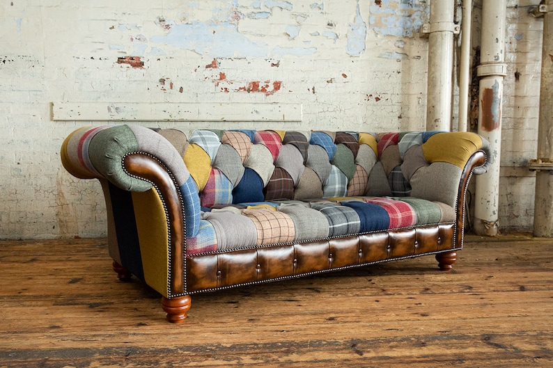 3 seater Patchwork Chesterfield Sofa. Shown in a range of multi coloured wool blend fabrics with contrasting antique tan leather details.