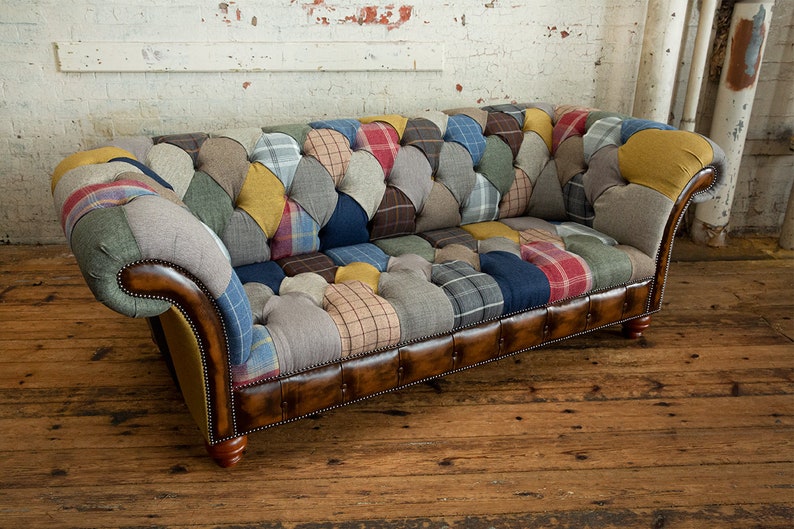 3 seater Patchwork Chesterfield Sofa. Shown in a range of multi coloured wool blend fabrics with contrasting antique tan leather details.