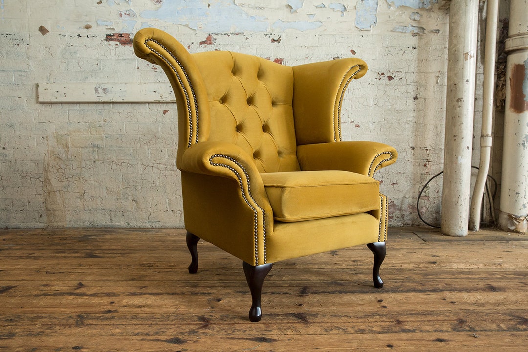 Yellow velvet wingback chair discount