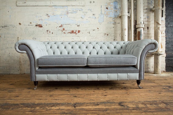 Grey sofa on sale with stud detail