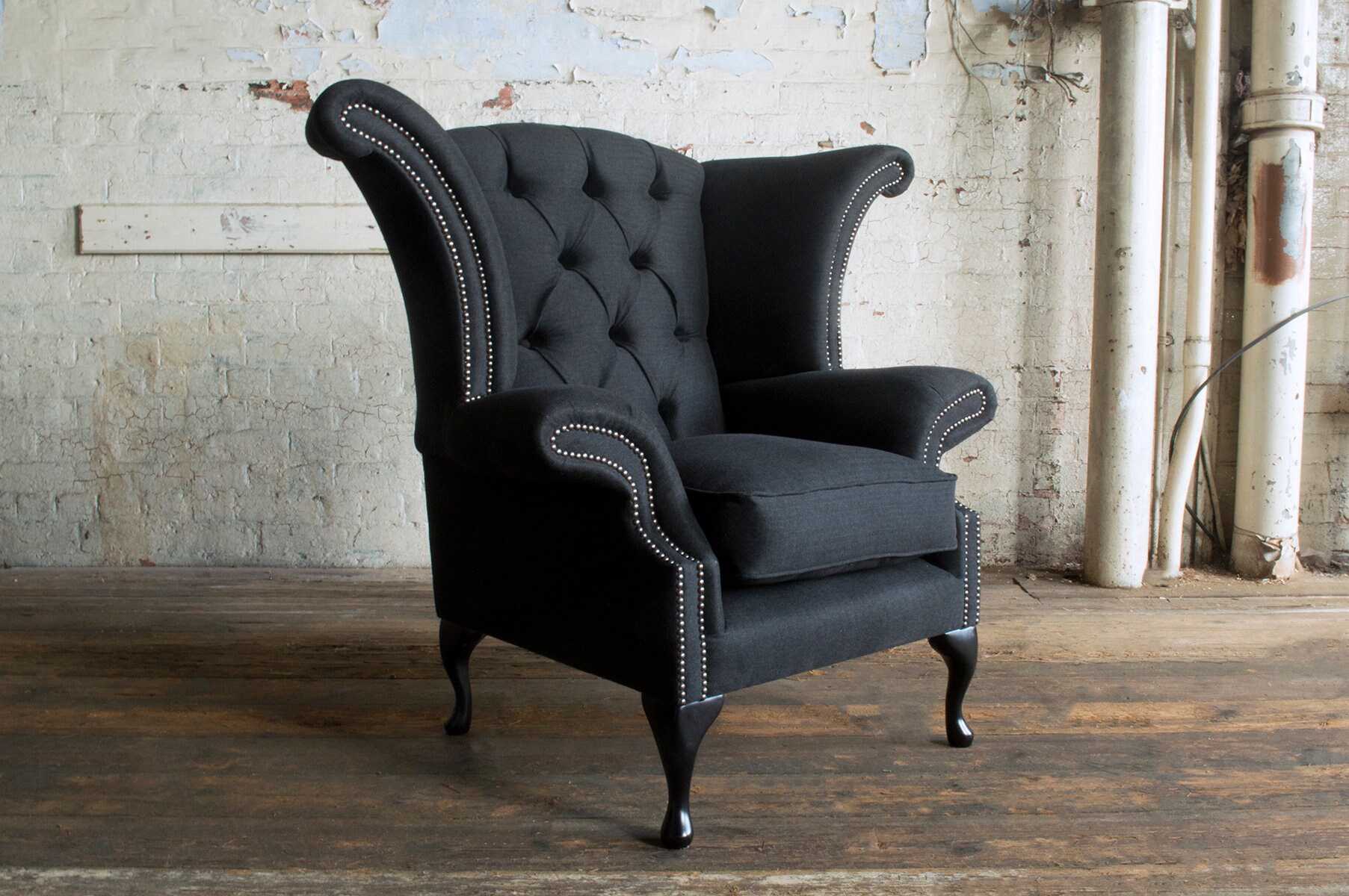 Black chesterfield wing chair discount