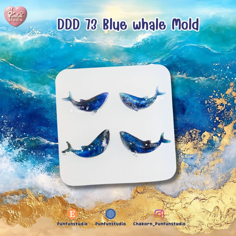 May include: Four blue whale molds with glitter accents are displayed on a white surface. The molds are in different positions, showcasing their design. The background features a blue ocean-themed design with gold accents, and the text "DDD 73 Blue whale Mold" is visible.