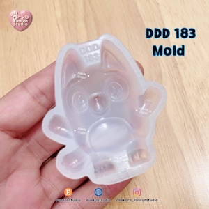 May include: A translucent silicone mold featuring the embossed shape of a cartoon dog with large eyes, pointed ears, and a rounded belly. The mold has the text DDD 183 Mold printed in the upper right corner and Punfun Studio logos throughout.