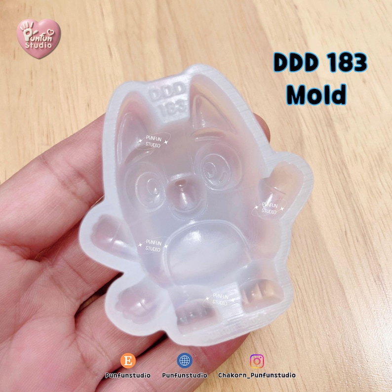May include: A translucent silicone mold featuring the embossed shape of a cartoon dog with large eyes, pointed ears, and a rounded belly. The mold has the text DDD 183 Mold printed in the upper right corner and Punfun Studio logos throughout.