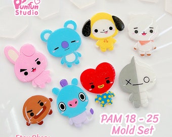 May include: A set of 10 silicone molds for making resin charms. The molds are shaped like various cartoon characters, including a bunny, a heart, a bear, a dog, and a bird. The molds are labeled "PAM 18-25 Mold Set".
