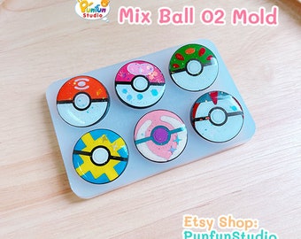 May include: A silicone mould with six circular cavities, each featuring a different design inspired by Poke Balls. The mould is white and has the text "Mix Ball 02 Mold" printed on it.
