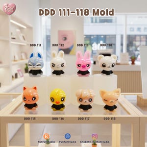 May include: Eight colourful animal-shaped molds are displayed, each wearing a black shirt. The molds include a blue wolf, white rabbit, pink pig, white bear, orange cat, yellow duck, tan dog, and orange fox. The text "DDD 111-118 Mold" is at the top.