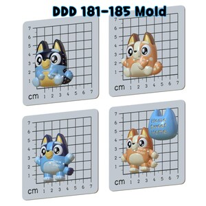 May include: Four silicone molds labeled DDD 181-185, each featuring a cartoon dog character on a grid background with centimeter markings. One mold includes a blue shape with the text Home Sweet Home. The molds are light gray with white grids.