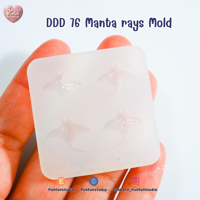 May include: A clear silicone mold with four manta ray designs. The mold is held in a hand and has the text "DDD 76 Manta rays Mold" in purple. The mold is from Punfun Studio.
