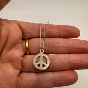 Peace sign necklace Minimalist necklace for her Tiny peace charm jewelry Spiritual silver necklace Boho festival peace jewelry Peace Now!