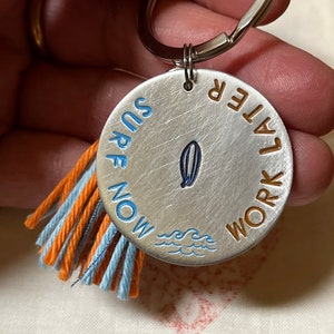 Surf Now Work Later Keychain Hand Stamped Round Tag with Palm Surfboard and Waves Charm Handmade Beach Gift for Surfer Aluminum Tag