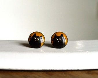 Pendientes gatos