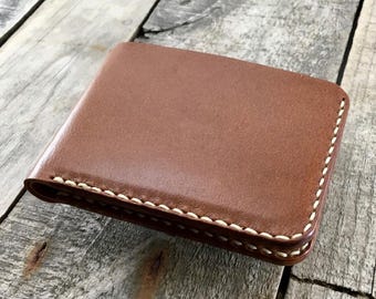 Cartera de piel de canguro hecha a mano por Nivisto. Duradera, elegante y perfecta para regalar. ¡Personalízala para darle un toque único!
