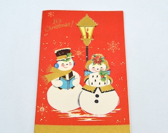 Vintage Christmas Card - Mr and Mrs Snowman Singing Carols Under Lantern - Used