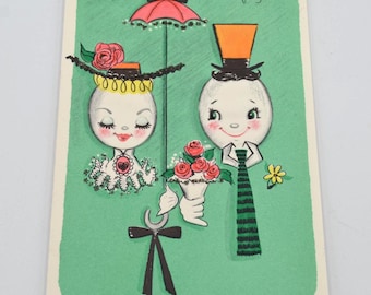 Vintage Easter Card - Anthropomorphic Egg Head Man and Woman on Aqua - To Both of You - Used Glitter Hallmark