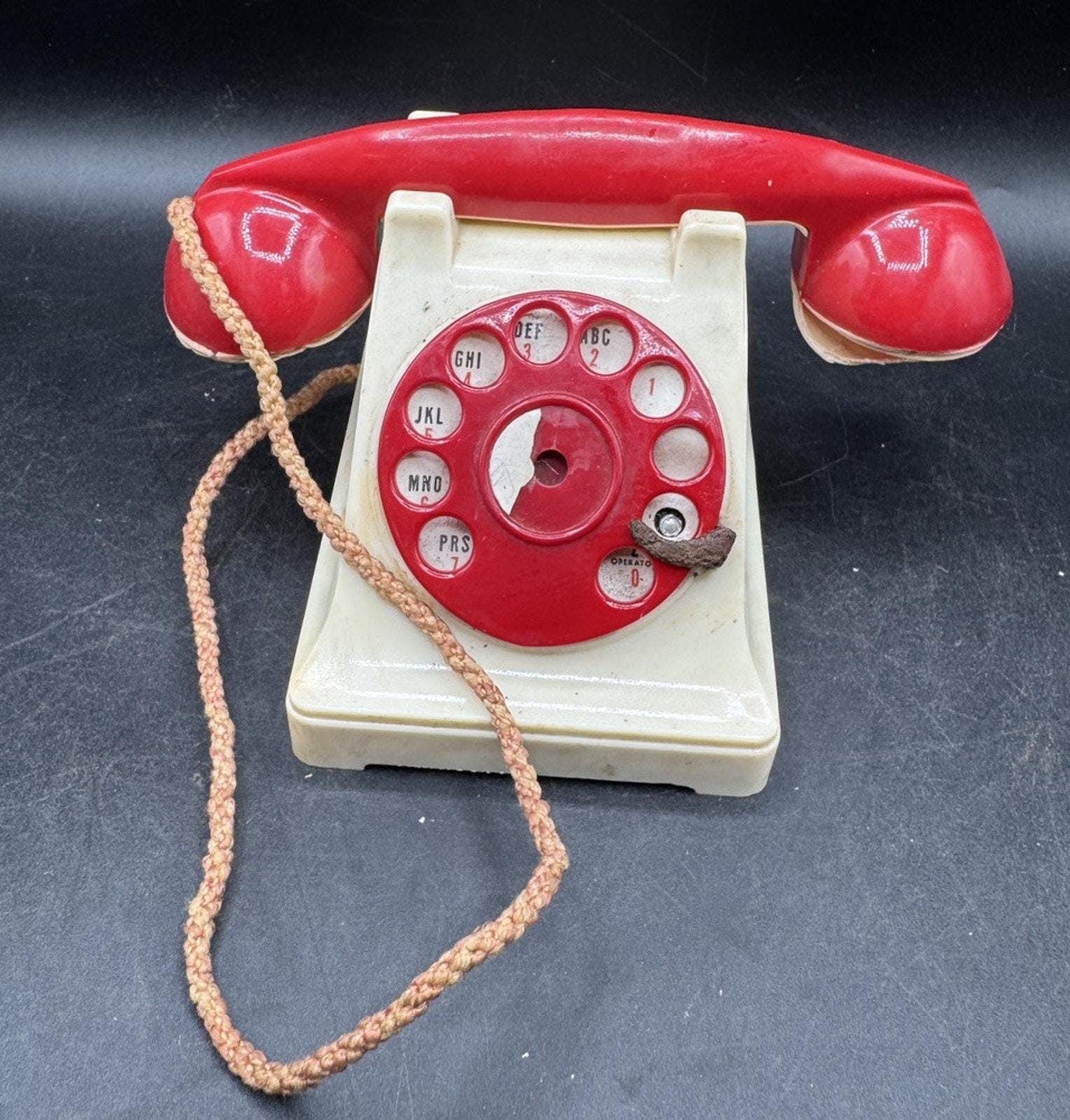 Telephone Ideal Toys Red Plastic bakelite Child’s Rotary Phone Poor Condition