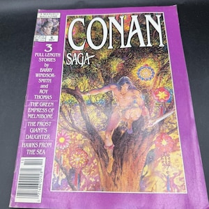 May include: A set of three ceramic mugs with a speckled, matte finish. The mugs are in shades of cream, light gray, and dark gray. Each mug has a simple, minimalist design, perfect for coffee or tea.