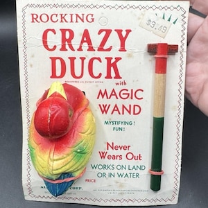 Crazy Duck vintage allié à bascule avec baguette magique, jouet n° 777 sur carte - T29
