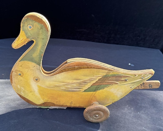 1950 年代のビンテージ木製アヒルの引っ張りおもちゃ、車輪付き、状態 