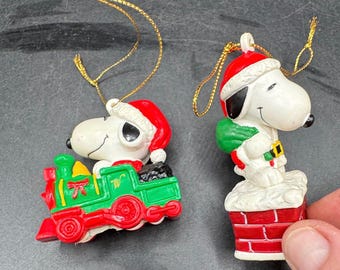 Snoopy Christmas Ornaments Lot 2 Holiday Peanuts Dog House Train & Santa Snoopy -C29
