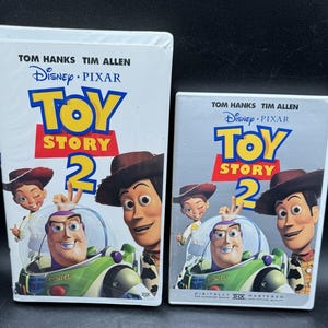 Toy Story 2 VHS Tape & DVD Set Disney Pixar Movie Used Great Condition