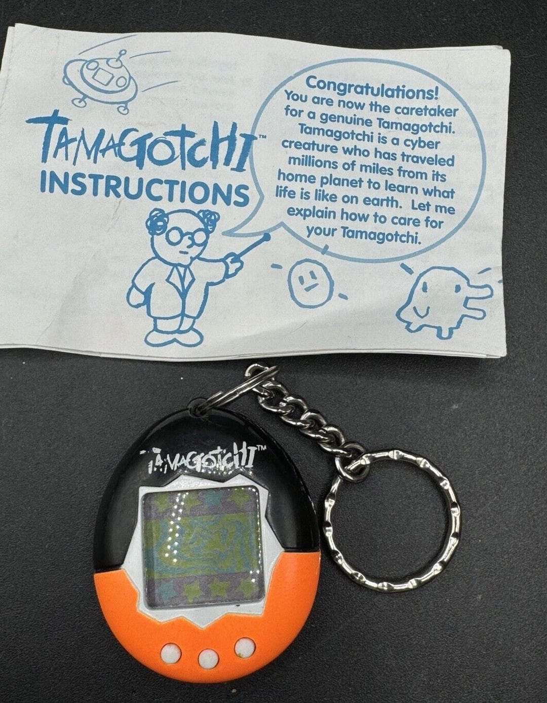 1997 Original Bandai TAMAGOTCHI Electronic Orange & Black Works! W