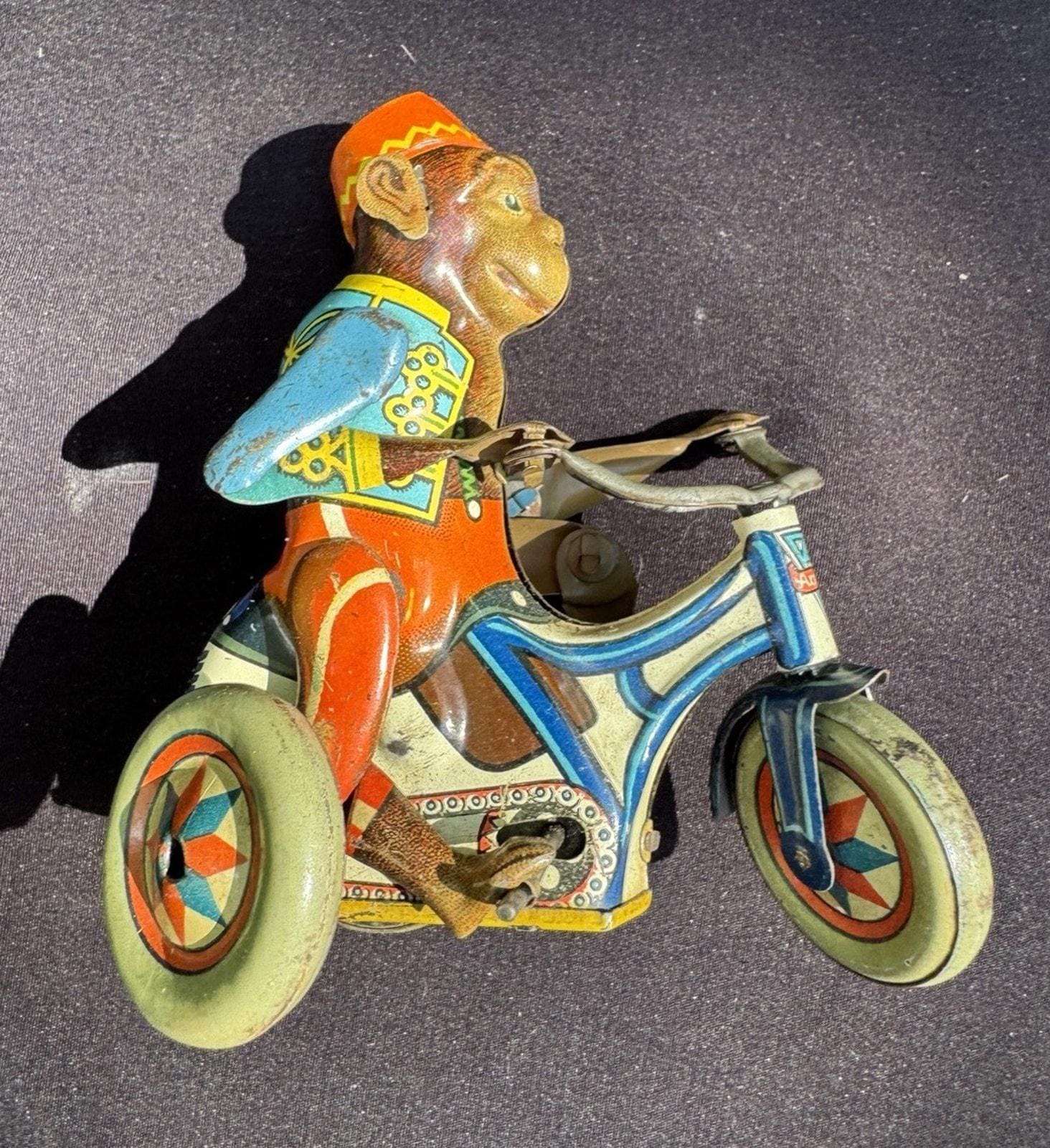 1920's Monkey Riding Tricycle US Zone Germany Wind-up Tin Toy
