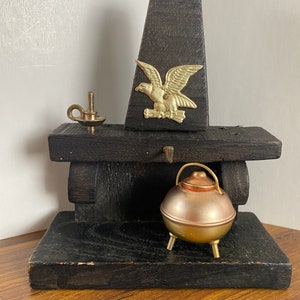 Vintage miniature wood fire place wall hanging, doll house furnishings, 1 candle, brass/gold eagle emblem, brass pot with lid to go on hange