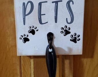 Cute and Handmade Wooden Pet Sign with a hook and lint roller, saying - Because Pets