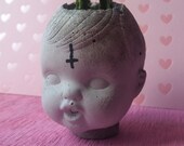 Baby doll head creepy cute upside down cross cement cactus and succulent bonsai planter