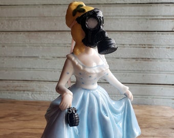 Gas mask lady porcelain statue apocalypse doll sculpture with hand grenade