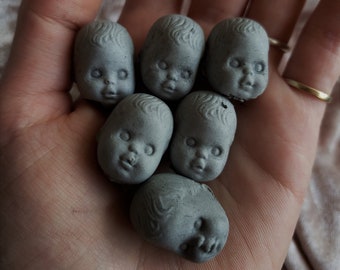 Creepy tiny baby head cement decorations for potted plants or fairy gardens