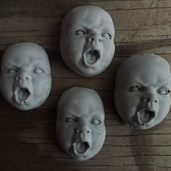 Creepy cement angry face decorations for potted plants or fairy gardens