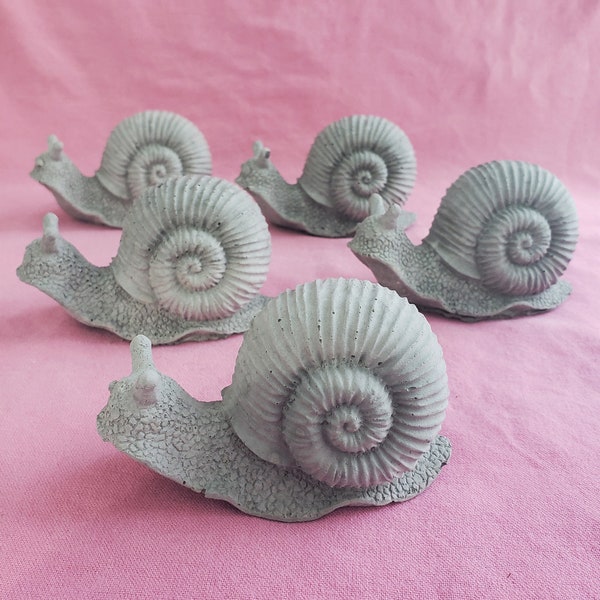 Snail garden sculpture made of cement