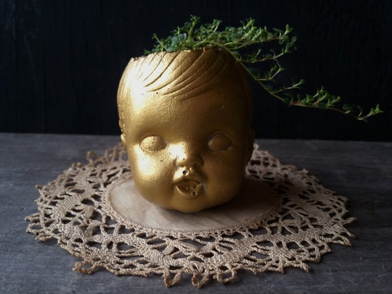 creepy baby doll head
