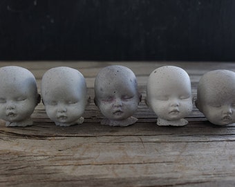 Creepy tiny baby head cement decorations for potted plants or fairy gardens