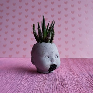 Lil baby doll head black mouth mini creepy cute cement cactus and succulent bonsai planter