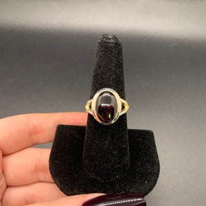High quality garnet .925 sterling silver sized ring- size 8