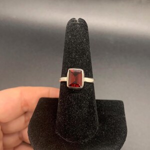 High quality garnet .925 sterling silver sized ring- size 8